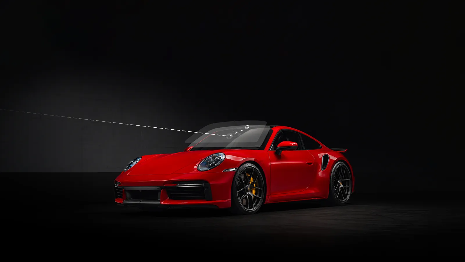 Red Porsche 911 (992) on a dark studio background, a vehicle with a pre-cut ExoShield ULTRA kit