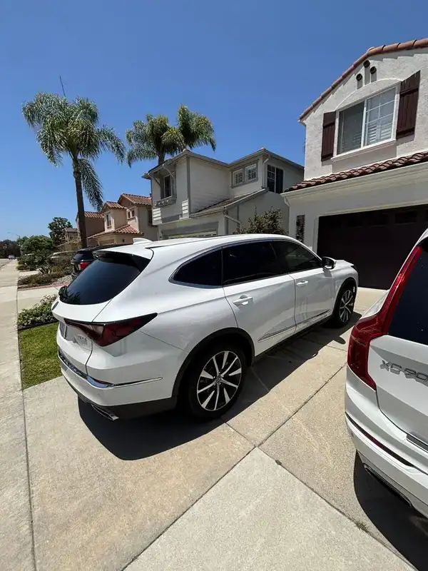 Pearl white 2026 Acura MDX with HiTek ceramic window tint installed by BestAutoTechs mobile window tinting in Carlsbad, San Diego County