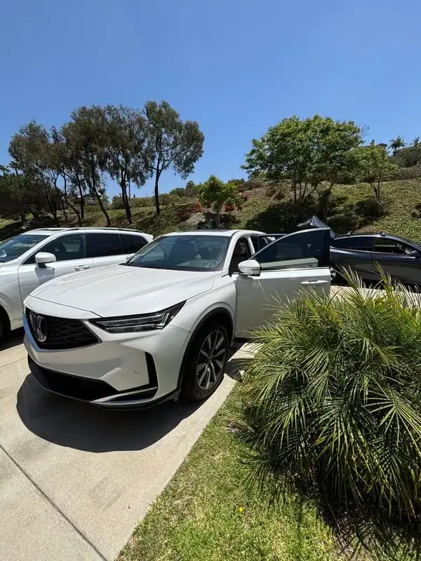 2026 Acura MDX with door open showing HiTek ceramic IR tint on side glass — Carlsbad mobile install