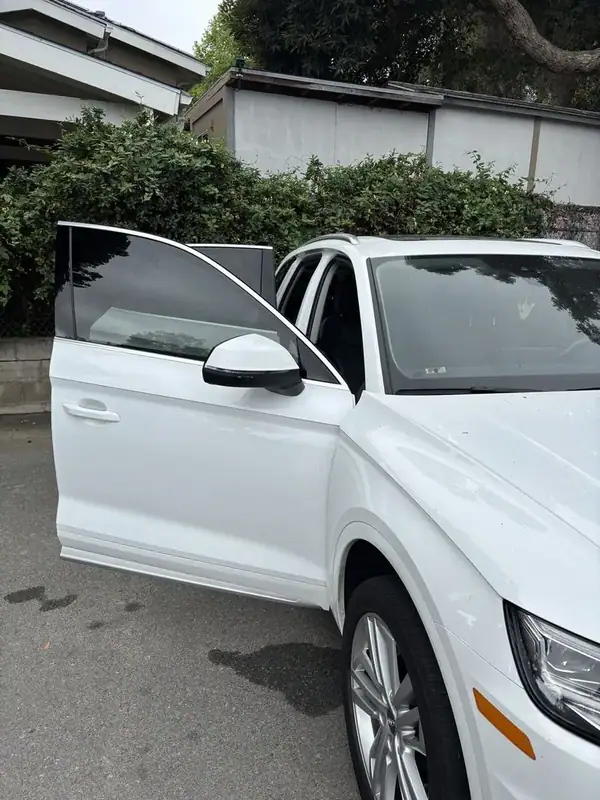 Audi Q5 driver side after ceramic window tint install — BestAutoTechs San Diego mobile service