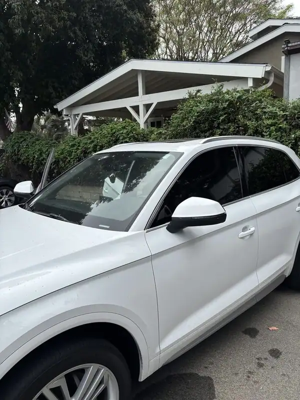 Audi Q5 detail shot of ceramic window tint film on side glass — BestAutoTechs San Diego
