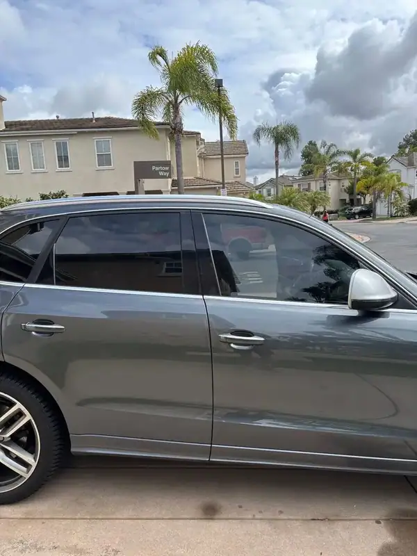 2015 Audi SQ5 Supercharged passenger-side rear after two front HiTek ceramic window tint install — color-matched to factory rear privacy glass, BestAutoTechs San Diego mobile