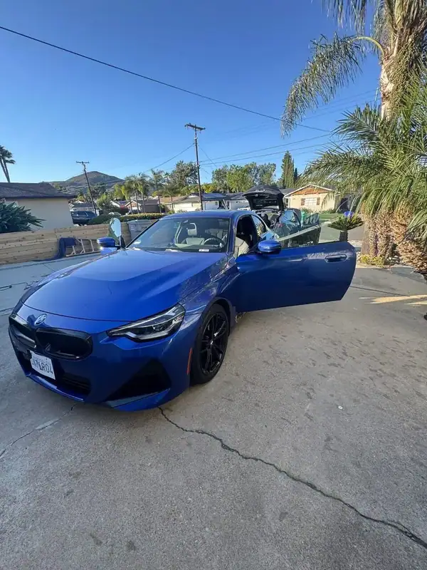 BMW 230i front three-quarter view with ceramic window tint — BestAutoTechs San Diego