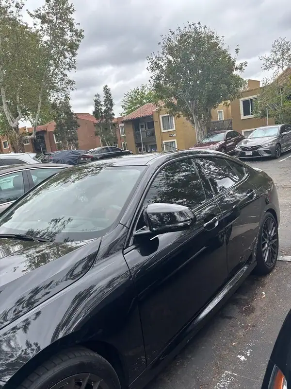 Black 2025 BMW M235i xDrive Gran Coupe front three-quarter view after ceramic IR window tint install — mobile window tinting San Diego