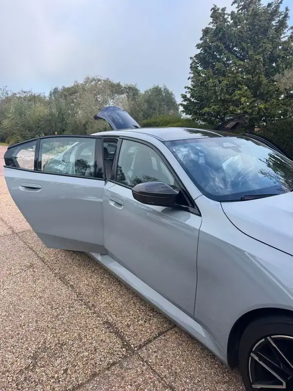 BMW M5 driver side showing 35% ceramic window tint — mobile tinting San Diego
