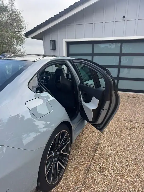 BMW M5 rear quarter view with M5 badge and ceramic window tint — BestAutoTechs San Diego