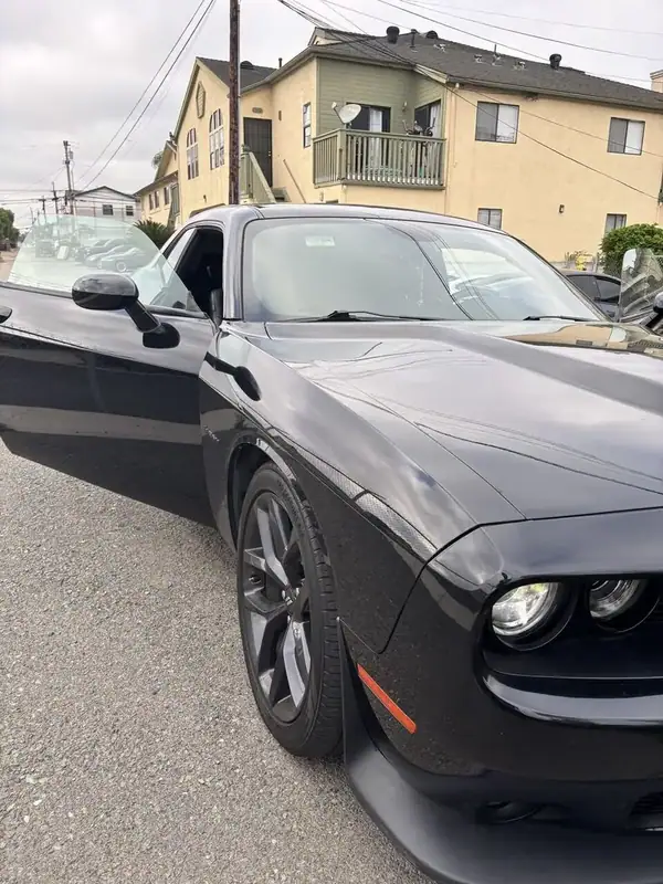 Black Dodge Challenger R/T HEMI front quarter view after ceramic IR window tint install — BestAutoTechs San Diego mobile service