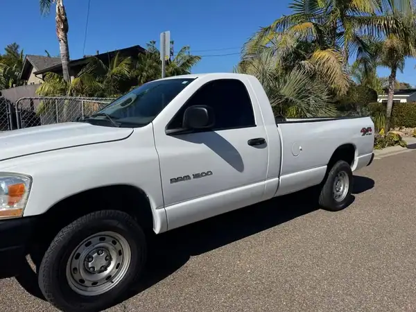 Dodge Ram 1500 4x4 with carbon window tint on sides and back installed by BestAutoTechs mobile window tinting in San Diego