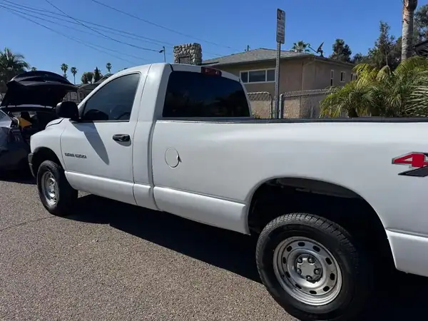 Dodge Ram 1500 4x4 rear quarter view with dark carbon window tint — BestAutoTechs San Diego