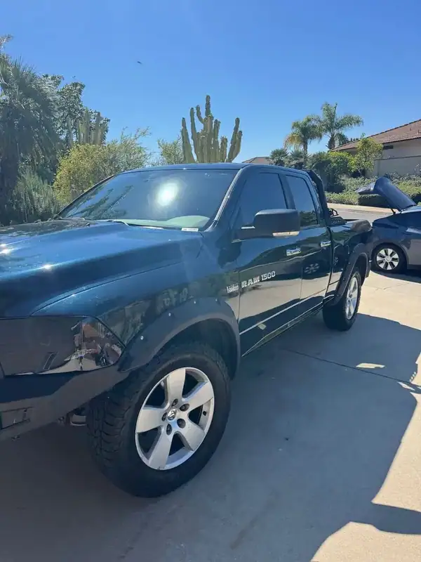 Dodge Ram 1500 Hemi 5.7 rear view showing dark ceramic tint on back glass — mobile tinting San Diego