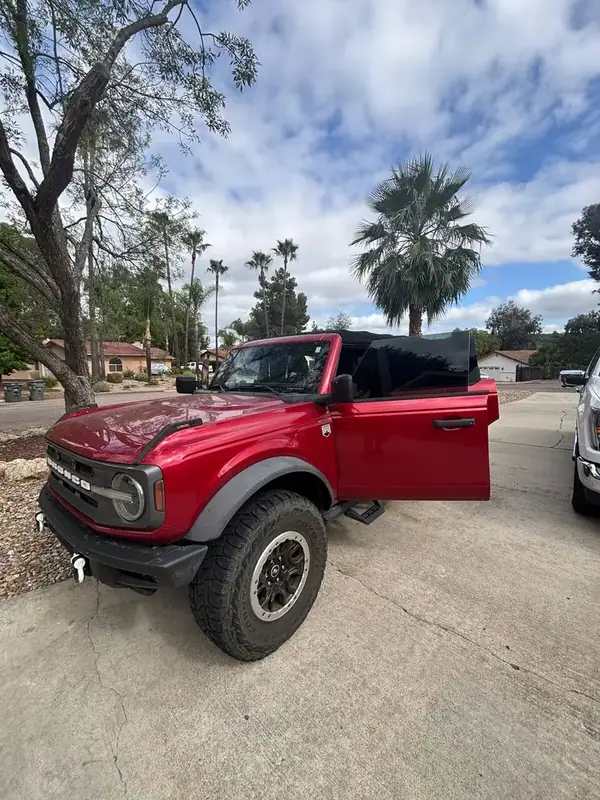 Race Red Ford Bronco Big Bend 4-door with dark HiTek ceramic window tint installed by BestAutoTechs mobile window tinting in Ramona, San Diego County