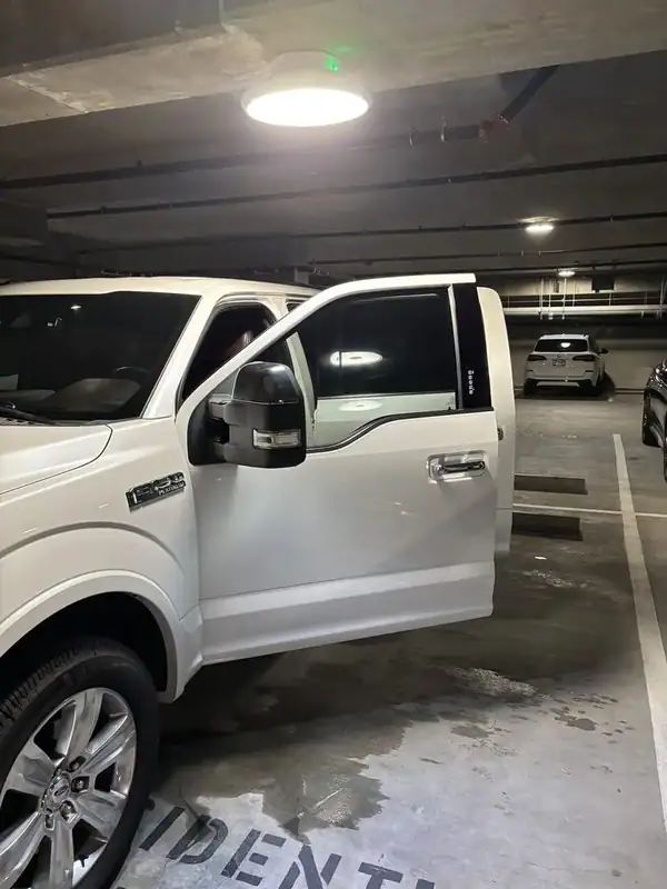 Ford F-150 Platinum driver side after ceramic window tint install — BestAutoTechs San Diego mobile service