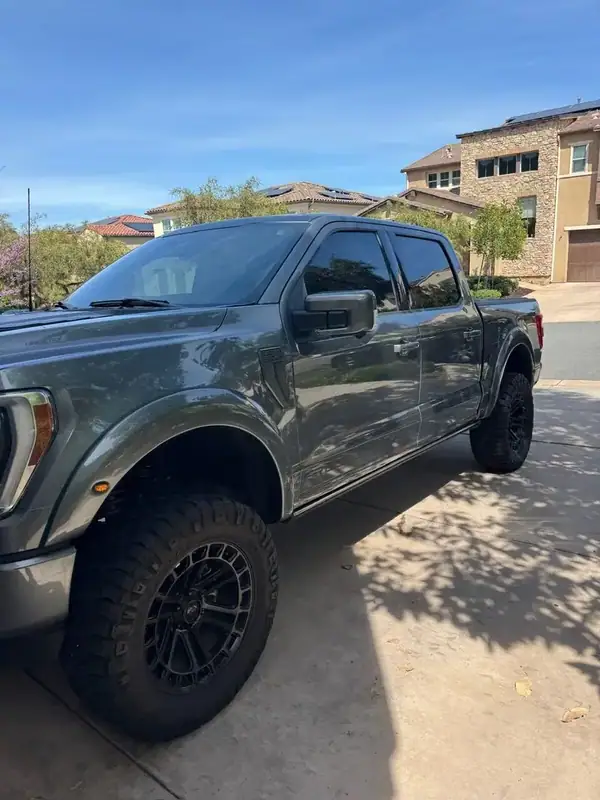 Ford F-150 Roush lifted truck side profile with ceramic IR window tint on all windows — San Diego mobile service