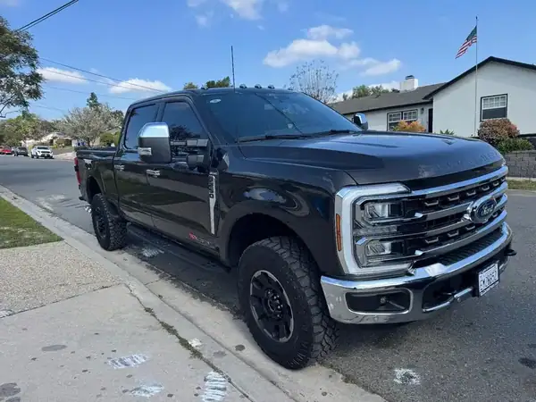 Ford F-250 King Ranch Tremor front angle with professional window tint — mobile service San Diego