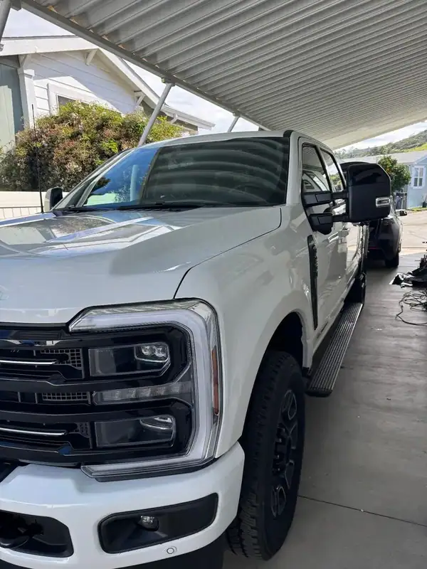 Ford F-250 Platinum with ceramic window tint on windshield sides and back installed by BestAutoTechs mobile window tinting in San Diego