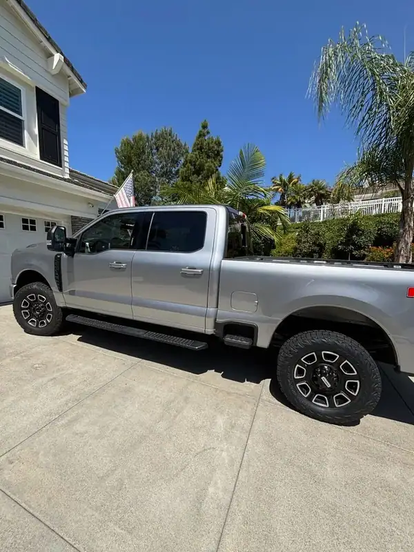 Iconic Silver Ford F-250 Super Duty XLT with HiTek ceramic window tint installed by BestAutoTechs mobile window tinting in Rancho Bernardo, San Diego