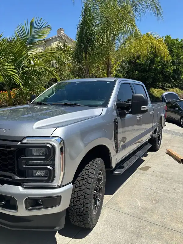 Ford F-250 Super Duty front quarter view showing HiTek ceramic IR tint on cab glass — Rancho Bernardo