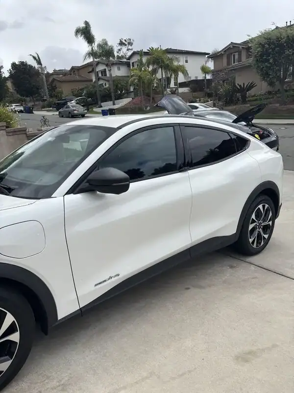 Ford Mustang Mach-E side profile with completed ceramic window tint — mobile tinting San Diego