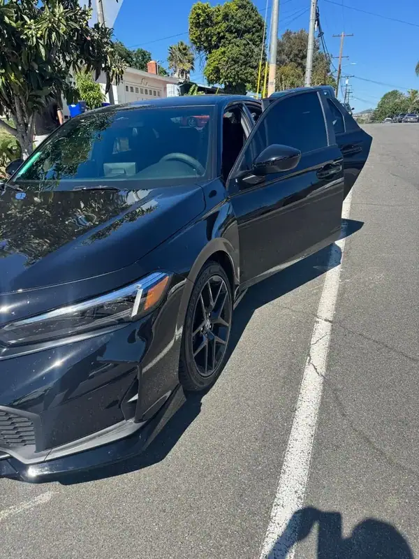 2026 Honda Civic front quarter view showing carbon window tint — mobile tinting San Diego