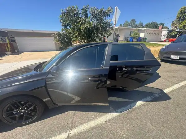 2026 Honda Civic side profile with carbon tint on all windows — San Diego mobile service