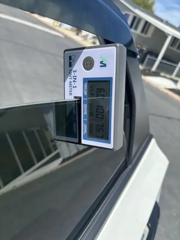 Close-up of Honda Civic front window glass after old 20% film removal and prep for new 70% ceramic IR tint install — BestAutoTechs San Diego