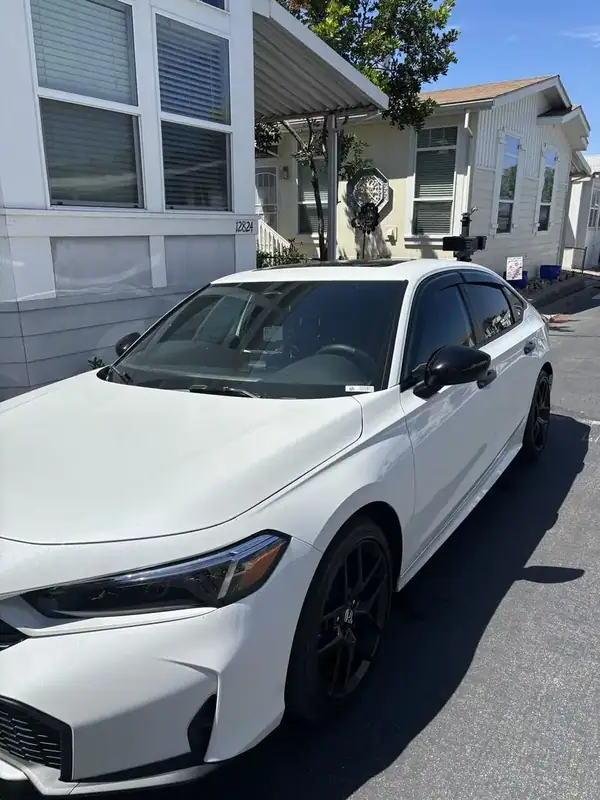 White Honda Civic Sport with new 70% HiTek ceramic IR front window tint replacing old 20% film — BestAutoTechs mobile window tinting San Diego