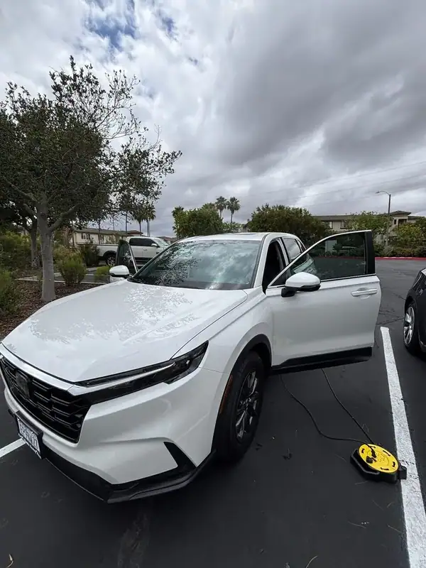 White 2026 Honda CR-V with full HiTek ceramic window tint and Crystal Clear ceramic windshield installed by BestAutoTechs mobile window tinting in Scripps Ranch, San Diego