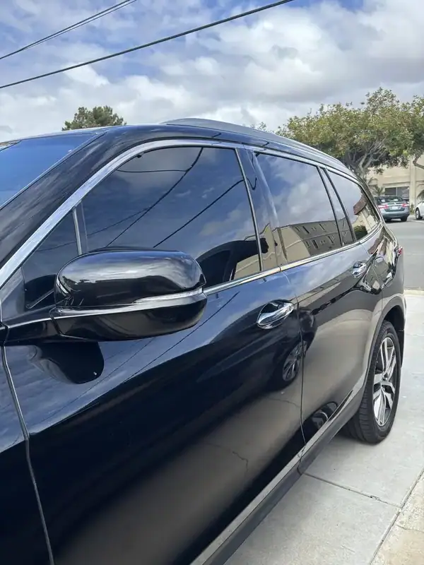 Crystal Black Pearl 2017 Honda Pilot Touring AWD with full vehicle ceramic window tint installed by BestAutoTechs mobile window tinting in San Diego