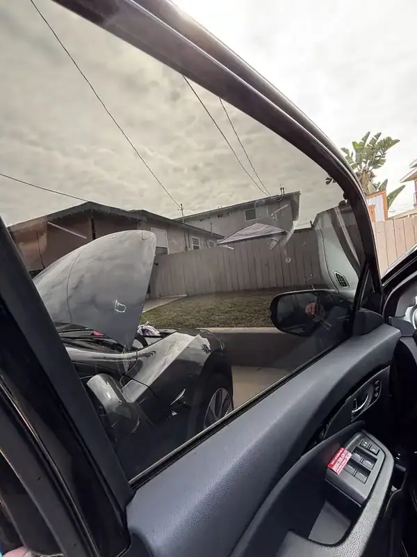 Inside view through front driver window of 2017 Honda Pilot Touring showing clarity of HiTek ceramic IR film with no purple haze — BestAutoTechs San Diego mobile