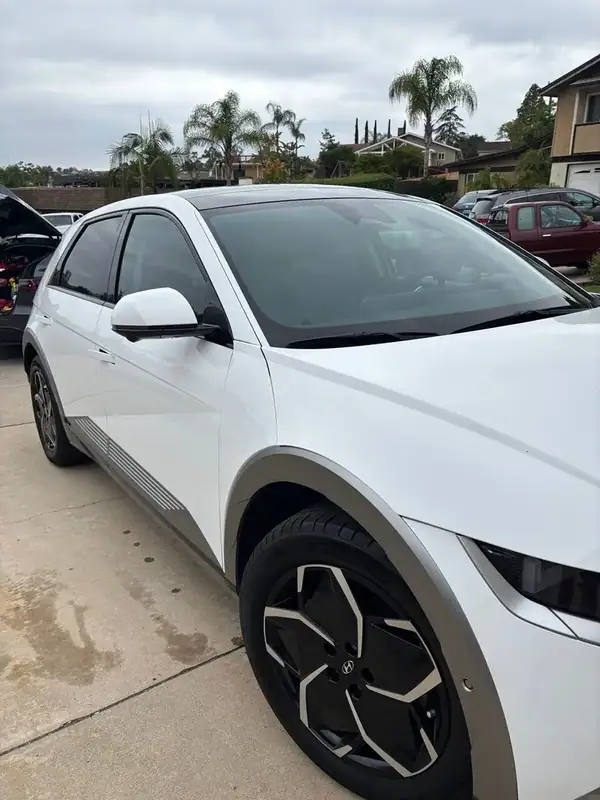 Hyundai Ioniq 5 front three-quarter view showing 70% HiTek Ceramic windshield and front window tint — BestAutoTechs San Diego mobile install