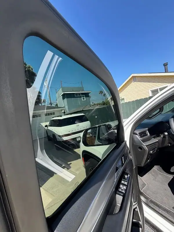 Jeep Wagoneer front quarter glass after HiTek ceramic IR tint install — color-matched to driver door for seamless factory look, BestAutoTechs San Diego mobile