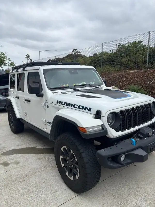 Bright White Jeep Wrangler Unlimited Rubicon 4xe after full HiTek Ceramic IR max heat rejection window tint install by BestAutoTechs mobile window tinting in San Diego