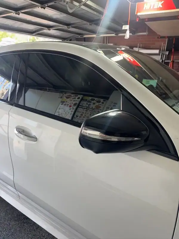 Mercedes-Benz GLE 53 AMG Coupe side window detail showing dark ceramic tint — San Diego mobile window tinting