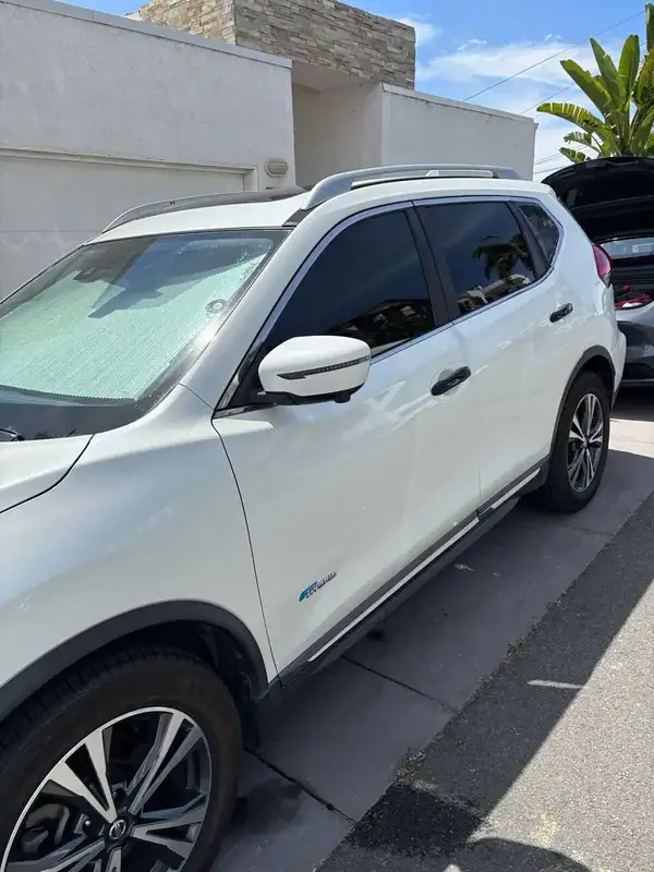 Nissan Rogue SV front passenger side after full HiTek ceramic window tint install — clean factory-style finish, BestAutoTechs San Diego mobile