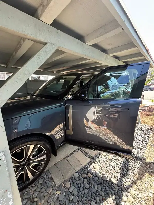 2026 Range Rover driver side with door open after ceramic window tint install — BestAutoTechs mobile service San Diego