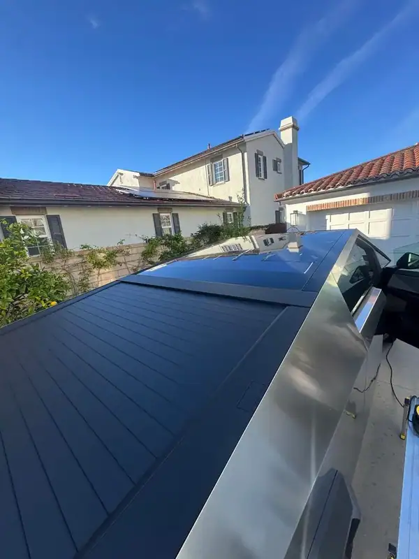 Tesla Cybertruck roof and windshield brow ceramic tint detail — San Diego mobile service