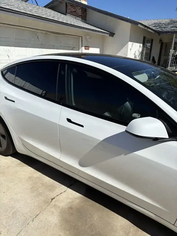 Inside view of 2021 Tesla Model 3 front window showing optical clarity of HiTek ceramic IR film with no purple haze — BestAutoTechs Ramona CA mobile