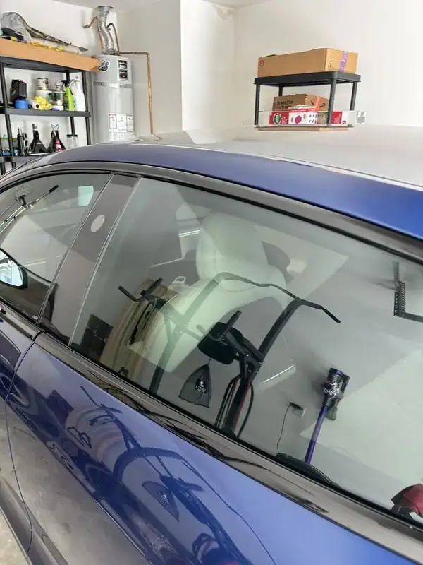 2021 Tesla Model S Plaid rear passenger window from above showing ceramic IR film tint depth — BestAutoTechs mobile window tint San Diego