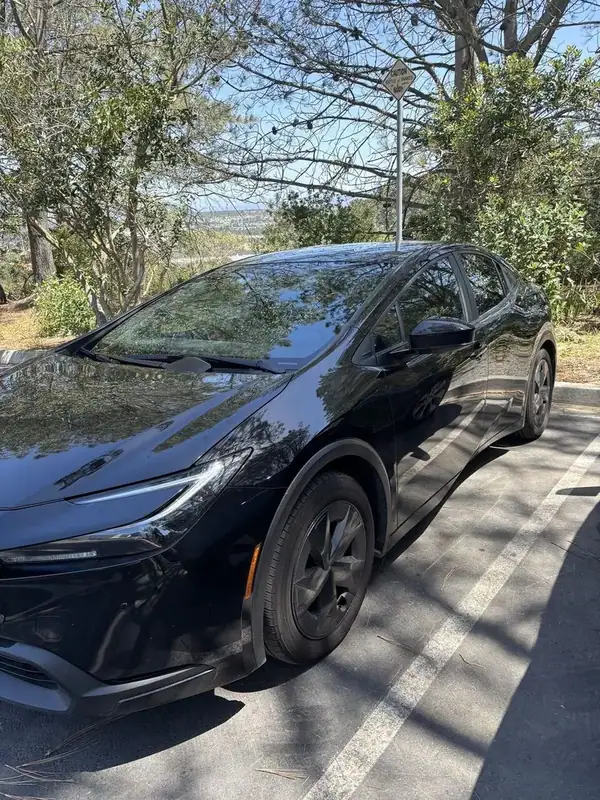 Black Toyota Prius hybrid with ceramic window tint installed by BestAutoTechs mobile window tinting in San Diego