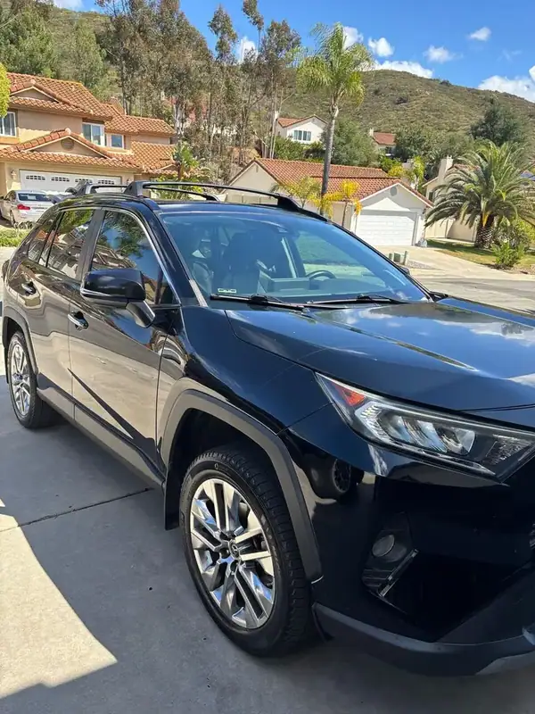 Midnight Black Metallic 2018 Toyota RAV4 Platinum with full HiTek ceramic IR 70% window tint installed by BestAutoTechs mobile window tinting in San Diego