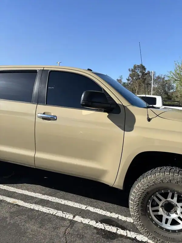 Toyota Tacoma Super Cab driver side after ceramic window tint install — BestAutoTechs San Diego mobile service