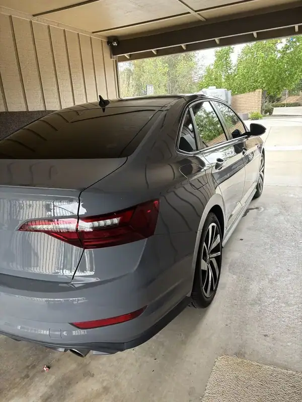 Volkswagen Jetta GLI front three-quarter view after full ceramic window tint — BestAutoTechs San Diego