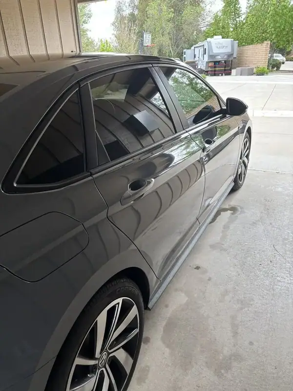 Volkswagen Jetta GLI driver side after ceramic window tint install — BestAutoTechs San Diego mobile service